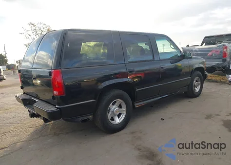 2000 Chevrolet Tahoe Limited from USA, damaged, VIN 1GNEC13R9YR229966